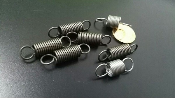拉簧用于兩種基本設計